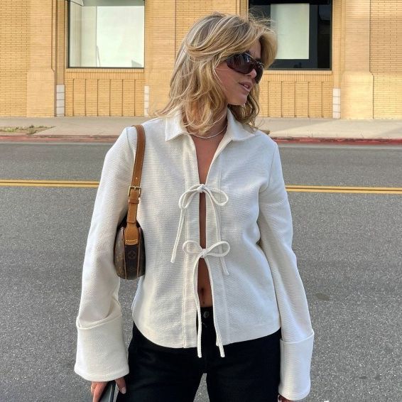 The Lace-Up Cardigan Jacket in apricot, front view